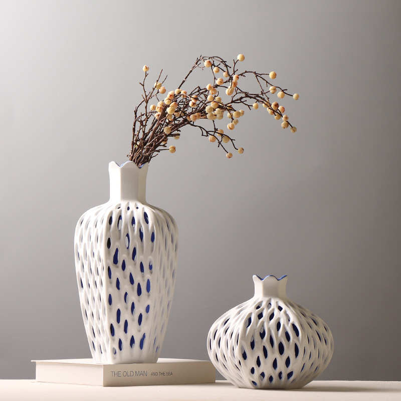 简约现代创意镂空杨桃花瓶样板房酒店轻奢插花装饰品摆件台面陶瓷