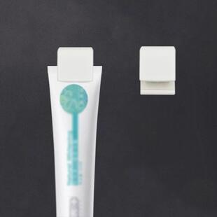 Wall-mounted toothpaste holder with no drilling required, su