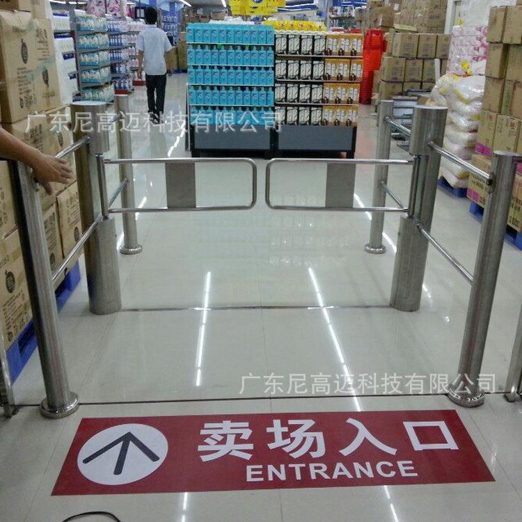 广州卖场入口单向自动感应摆闸门电动单向双通道出入口旋转门滚栅
