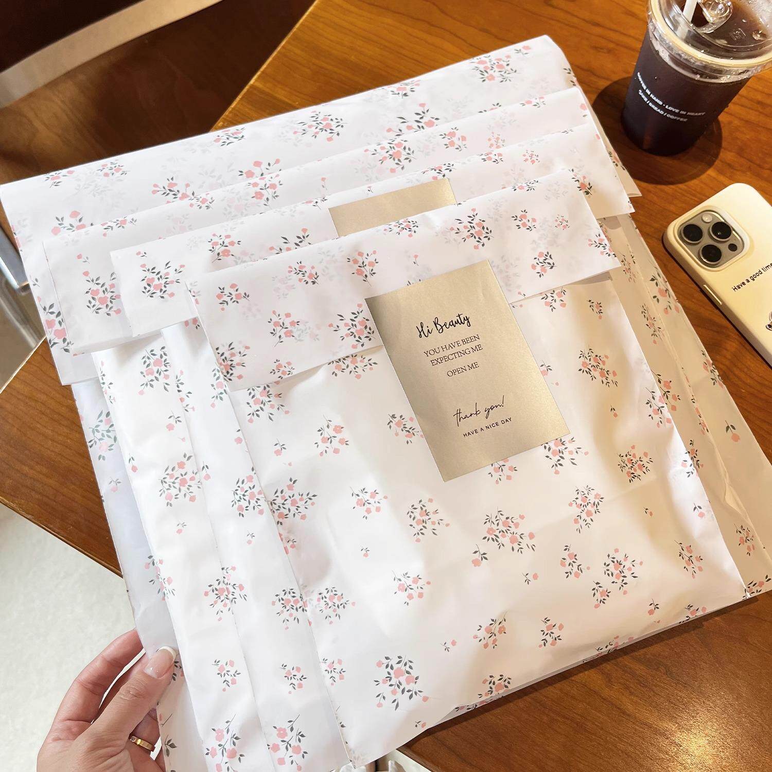 高档服装店碎花平口磨砂塑料袋礼品包装打包带女装衣服袋子