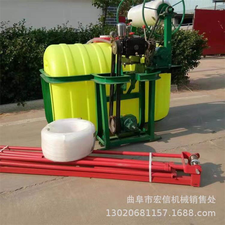 轮HX-DYJ-1拖拉机悬挂式打药机 轴传动自动四管喷药卷机 8打米展