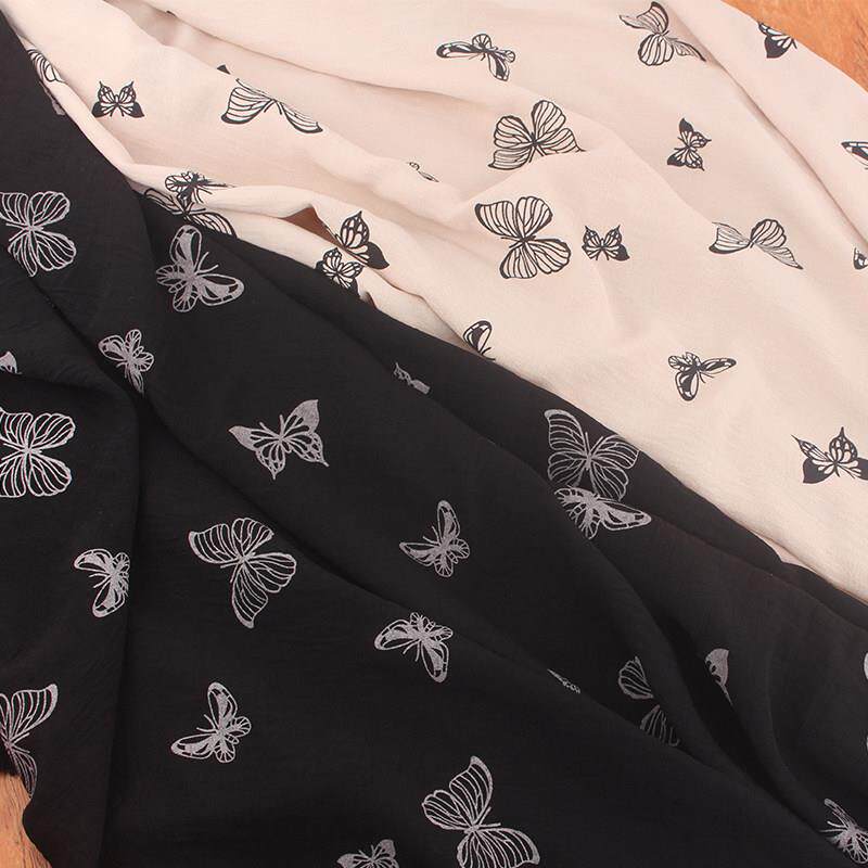 新款有弹力仿竹节麻绉冰绉蝴蝶印花布料夏季连衣裙居家服有弹面料
