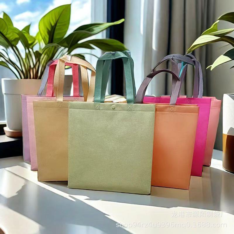 无纺布手提袋高级感定制服AGC装折店纺布袋无子做叠礼定品购物袋