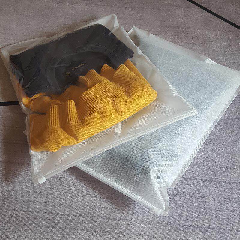 现货单面无纺布5c透明膜防尘收纳袋有拉链自封口服装包装袋可定制