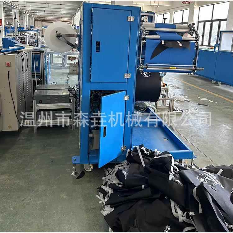 一次性无纺布围兜制造机pvc厨房防水防油围裙机系带围裙设备