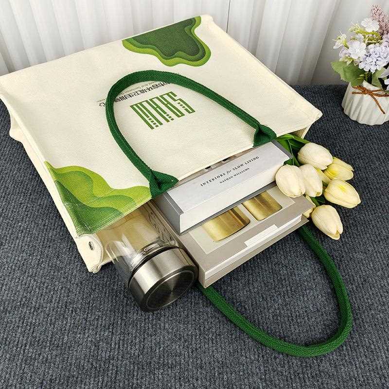 新款直销复合帆布托特包 加厚高端飘带包环保袋腹膜防水立体帆布