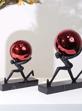 轻人球奢负重人物感柜风玄关摆件电视柜高级现代背前行抽象艺术