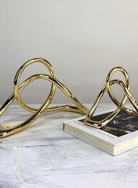 客厅电视背景墙两边的摆件现代简约创意艺术几何树脂扭结样板房售