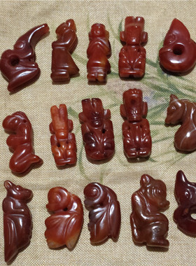 供应红玛瑙玉髓红山文化太阳人玉猪龙瑞兽手把件地摊会销玉货