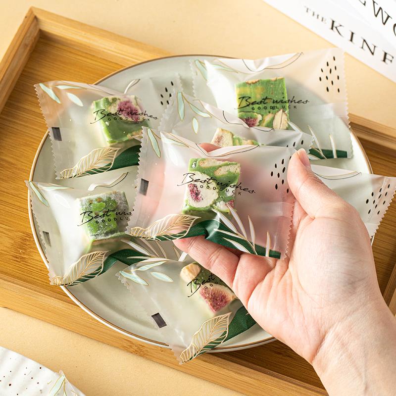 雪花酥包装袋新款纸机封子自牛轧糖果太妃饼干奶枣糕的曲奇烘焙盒