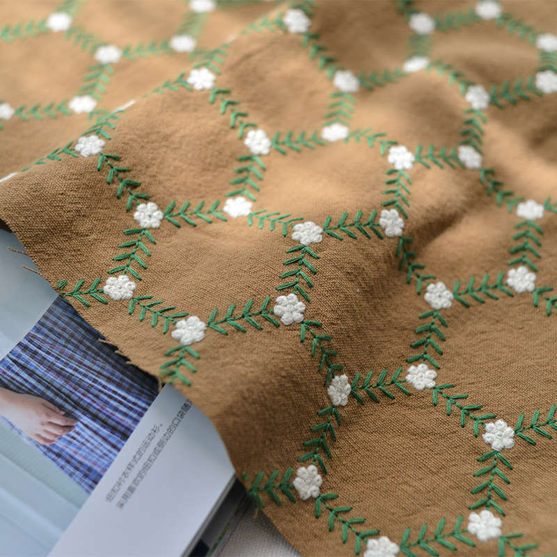 棉麻砂洗六边形花刺绣棉麻布料田园日韩面料现货供应水洗布料
