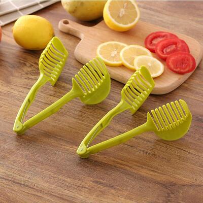 Manual kitchen tool, a versatile fruit slicer that can be us