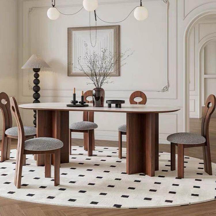 法式奶油风洞石岩板餐桌餐厅家用小户型饭桌椭圆形实木餐桌椅组合