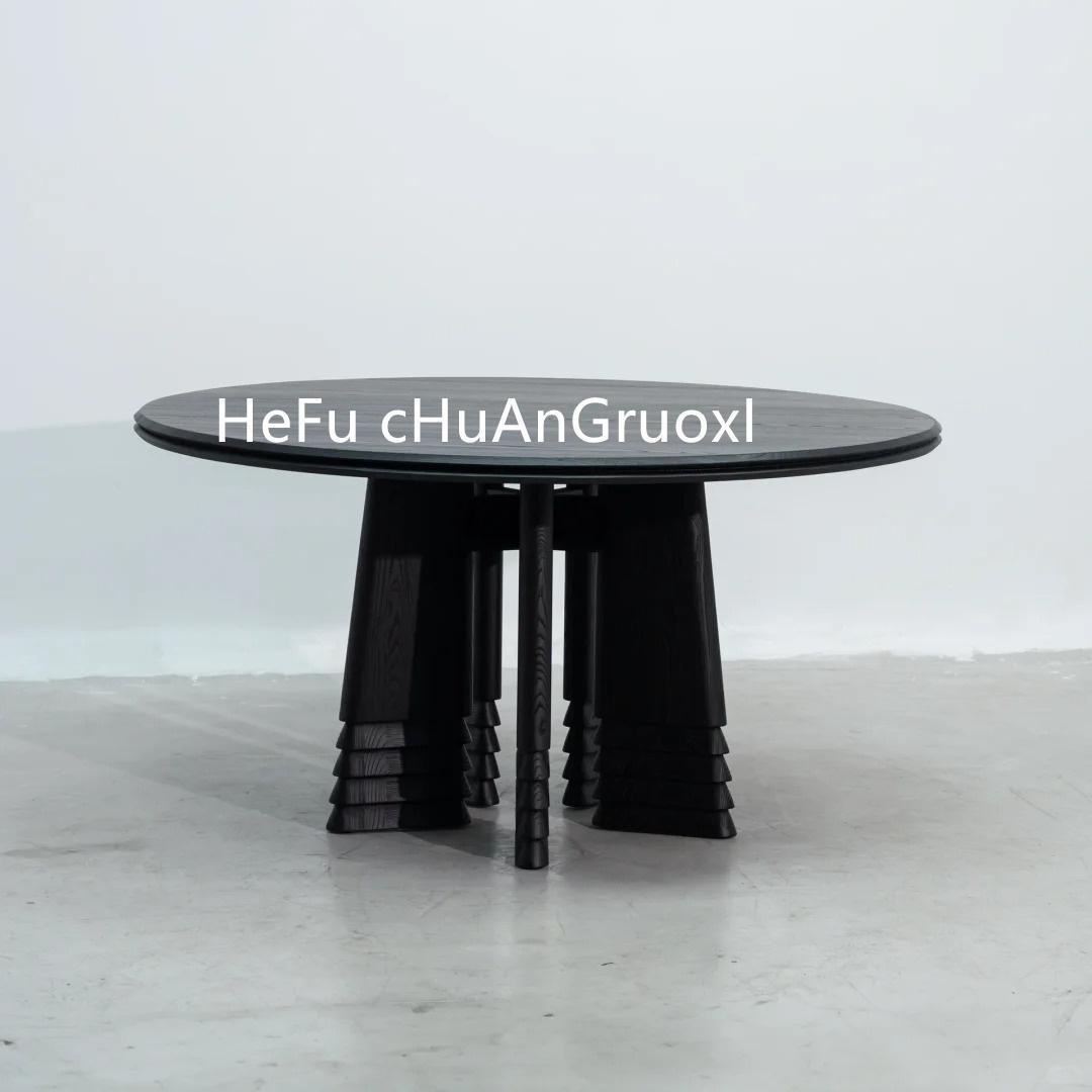 中古侘高端圆形实木餐桌家用覆古黑色吃饭桌设计师创意圆桌艺术