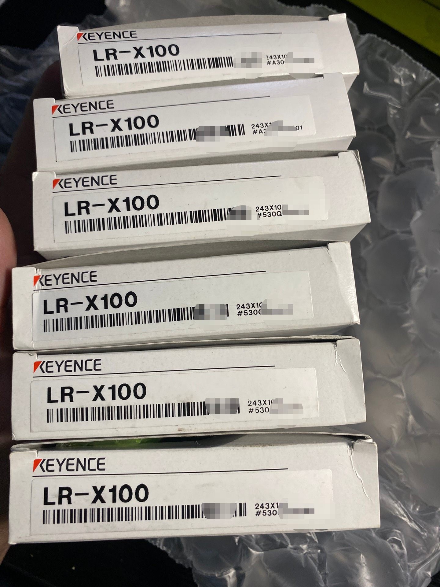 基恩士LR-X100，全新正品码盒一致。