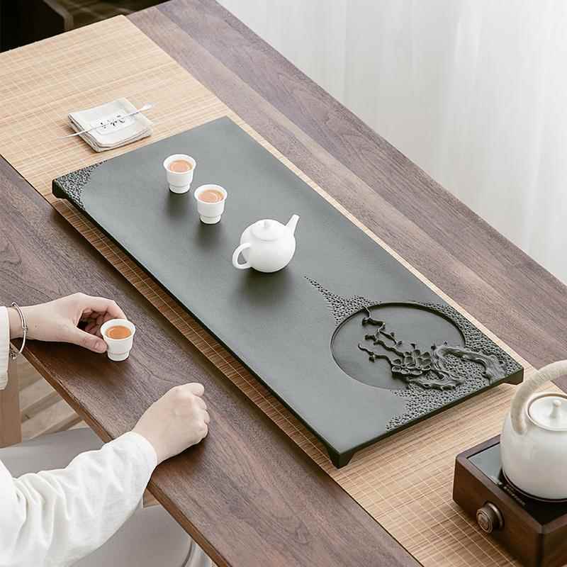 天然乌石盘整手工雕刻石头茶台新中式石材块梅花之韵排水茶海高茶