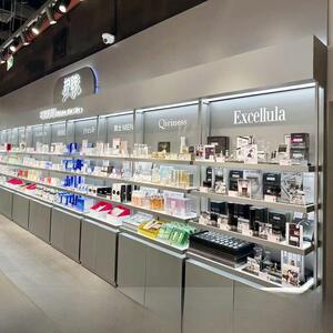 靠墙的化妆品展示柜轻护肤品面膜岛展示架美容店货架彩妆展示架