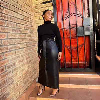 Womens black buckle mid-length slits skirt with and leather
