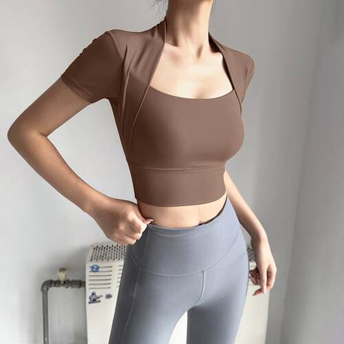 Sports short sleeved women's yoga suit with chest cushion,