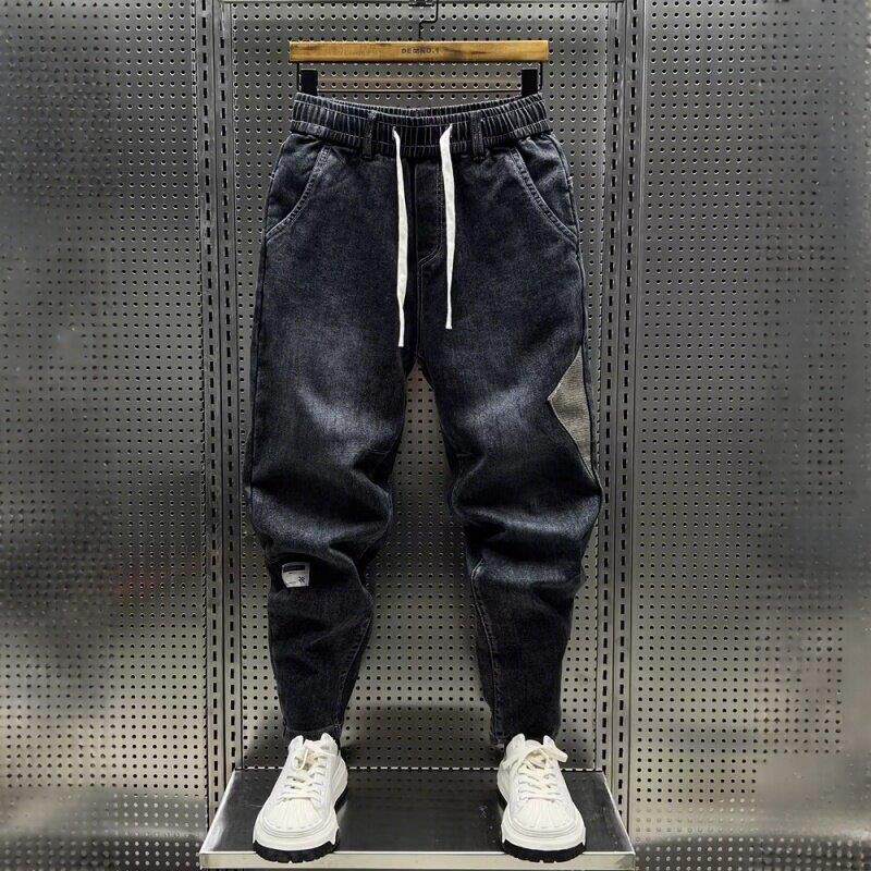 潮牌2525牛仔裤男士水洗百搭弹力裤子男休闲潮流宽松小脚哈伦长裤