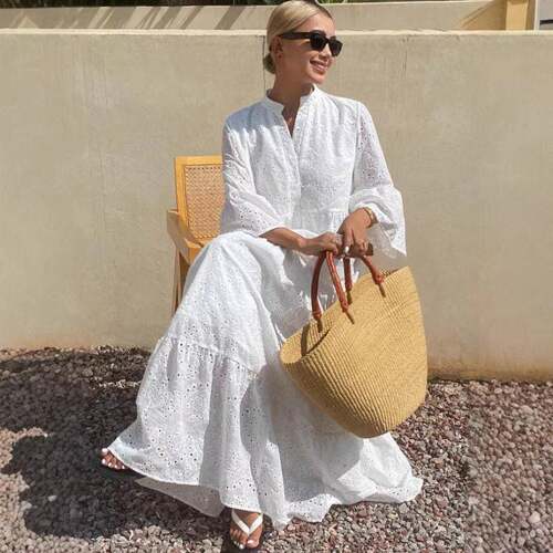 A women's white fashionable French flared sleeve tunic dress
