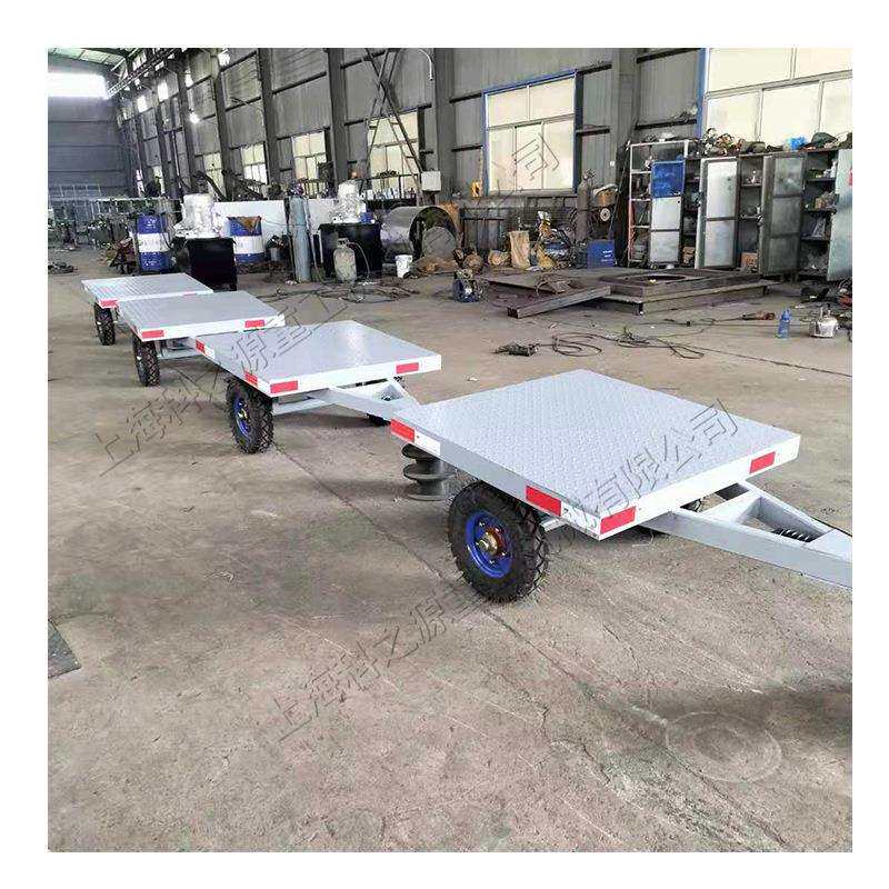 小型牵引式平板拖车装卸大型货物运输车工厂仓库集装箱搬运车
