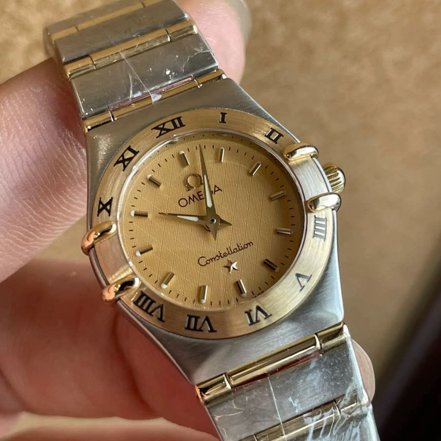 正品9.8新欧米茄星座系列18K黄金精钢石英手表22MM女表1262.10.00