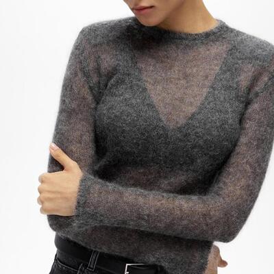 Short hollowed out knitted sweater women's long sleeved