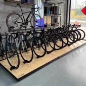 定做电动车自行车店展示地台展台山地车货架展柜落地公路车展示架