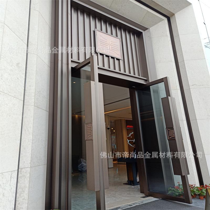 售楼部酒店不锈钢新中式门头装饰设计房地产商场仿铜弧形金属门套