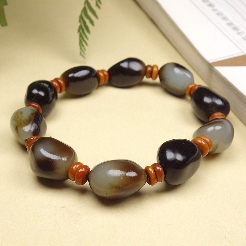 收藏级新疆和田玉黑皮籽料原石肉质细腻油润石来运转手串39.00克