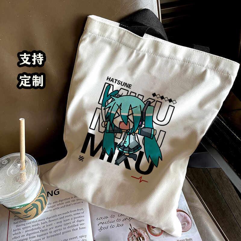 初音联名周边未来MIKU帆布袋二次元单肩包男女学生手提包装书袋包