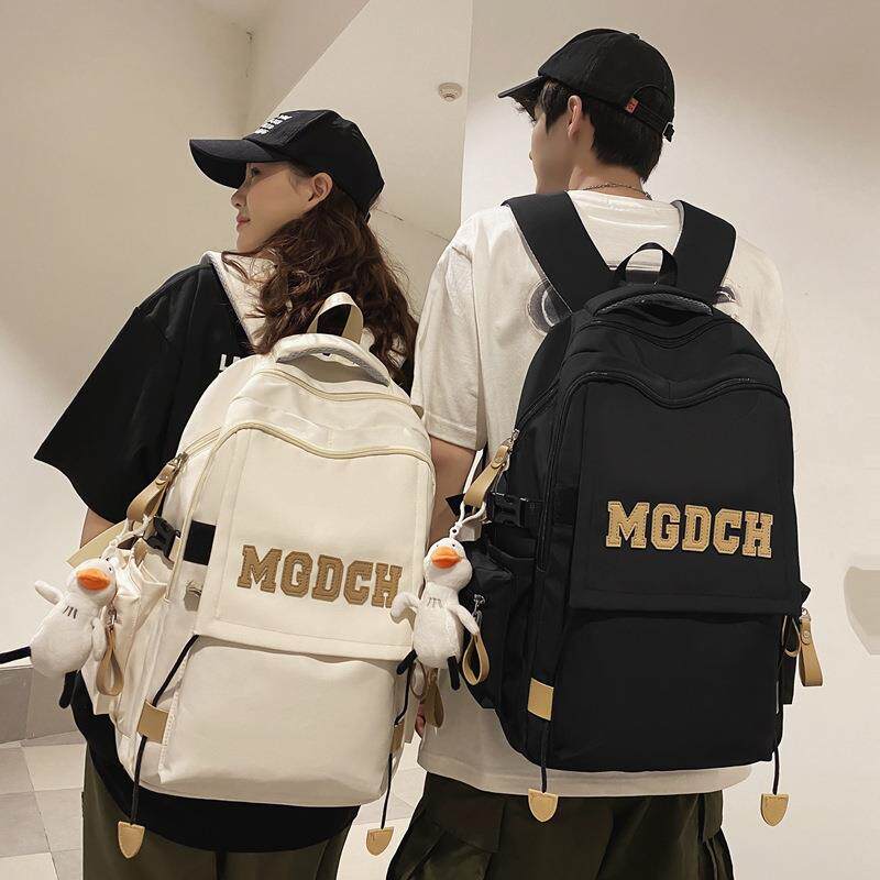 书包女生大学生高中学生酒红色背包初中生小学生大容量减负双肩包