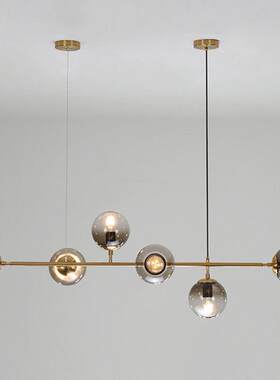 北欧简约餐厅桌长条玻璃圆球灯具设计师吧台轻奢铁艺金色魔豆吊灯