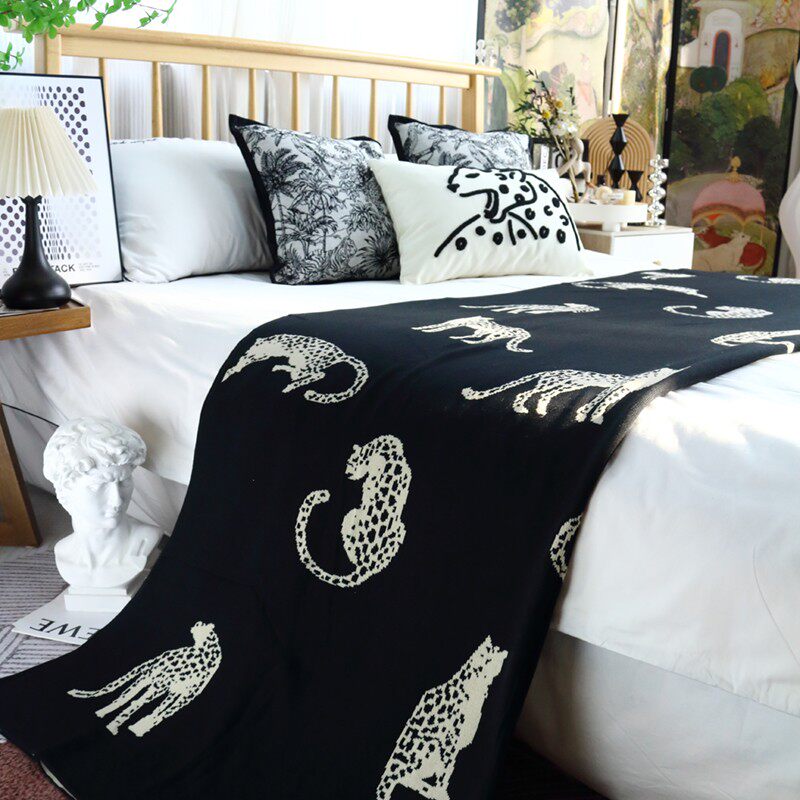 轻奢中古猎豹毛毯针织毯复古客厅沙发毯民宿床尾毯床尾巾黑色盖毯