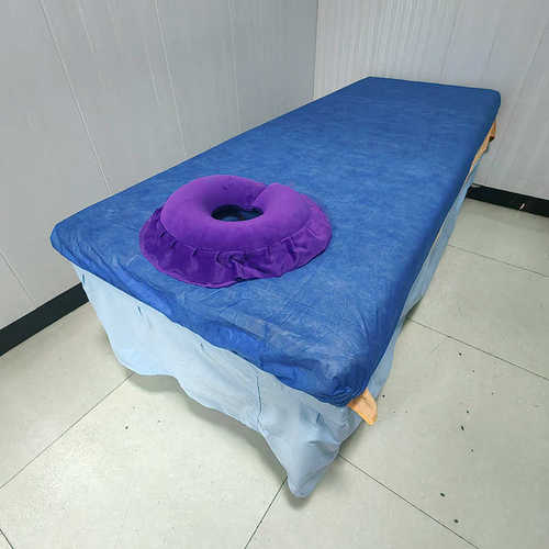 蓝色一次性床罩美容院床单美容床按摩垫无纺布带洞透气100张床笠