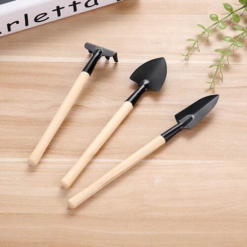 A three-piece gardening tool set, perfect for planting flowe