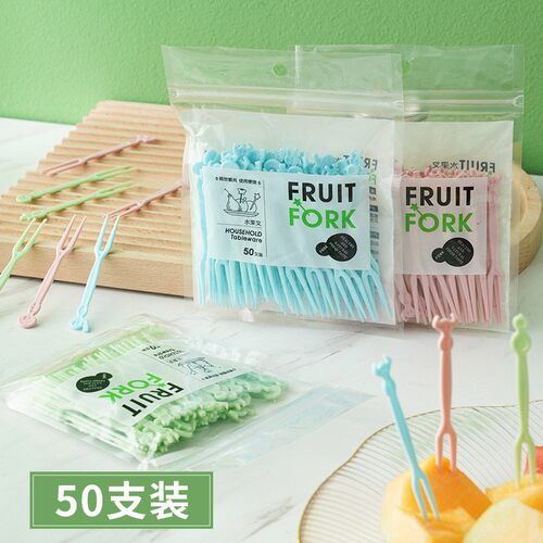 Set of disposable plastic two-pronged fruit forks, ideal for