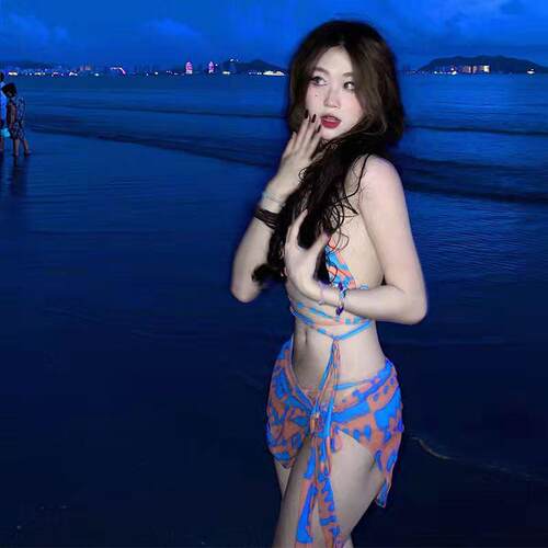 Bikini swimsuit style with white highlighted three part