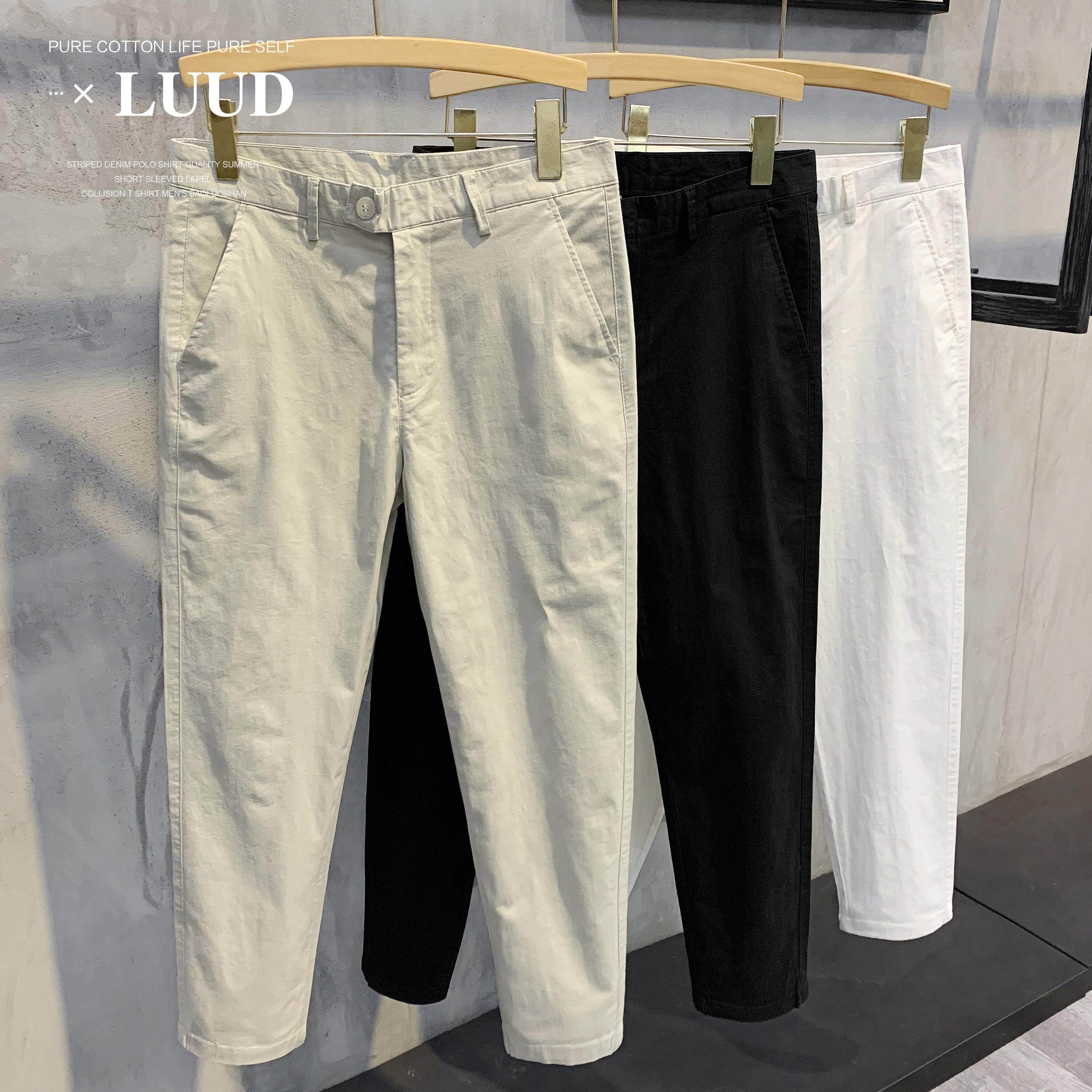 潮牌秋季杏色复古纯棉质休闲裤韩版简约男士帅气修身小脚九分西裤