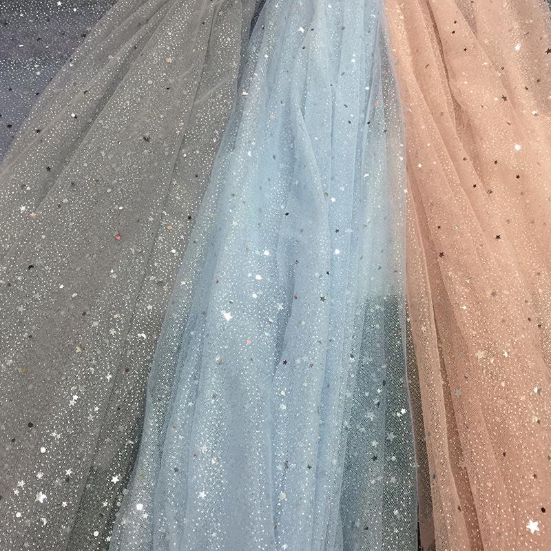 厂家供应 月亮星星亮片网纱布网眼布裙纱女装面料 新款