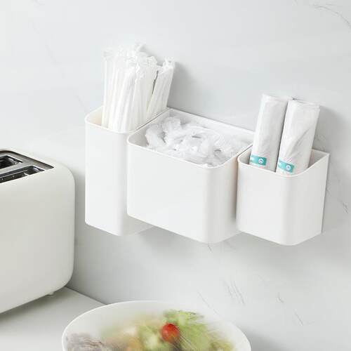 Wall-mounted storage box for kitchen trash bags, paper cups,