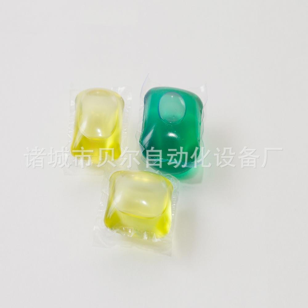 PVA水溶膜包装机双色15克洗凝珠包装洗衣凝珠高速包装机