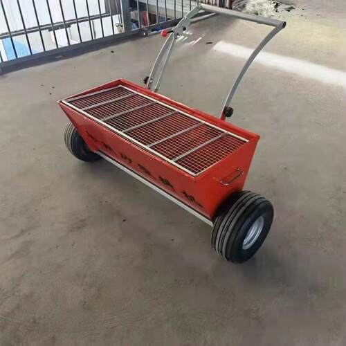 手推式混凝土厂房地坪撒灰机 后拉式金刚砂撒料机 路面撒料机