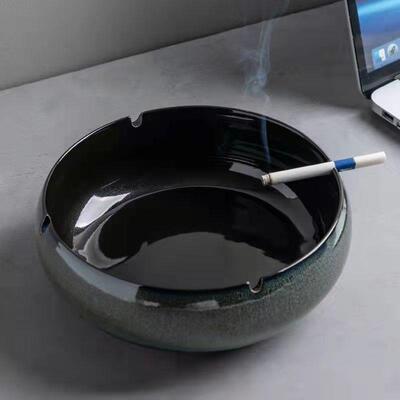Large ceramic ashtray, suitable for home use, featuring a si