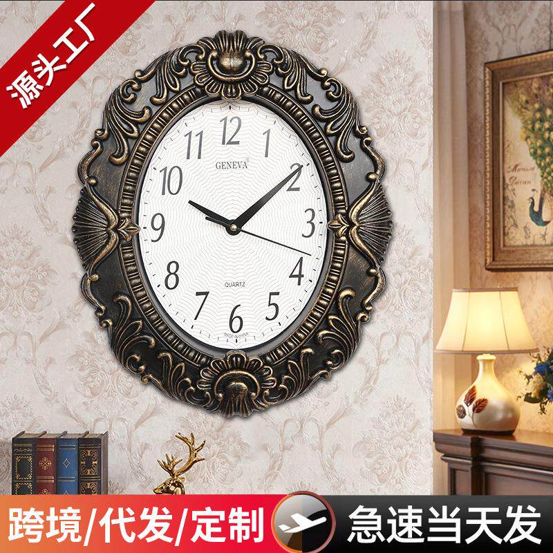 西班牙钟表客厅轻奢时钟挂墙家用13.3寸椭圆形仿镜子复古创意挂钟
