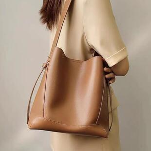 法国MK水桶包女2025新款高级质感真皮大容量单肩包通勤百搭斜挎包