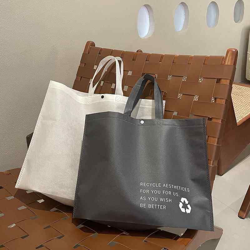 服装店环保无纺布手提袋男女装商用加厚袋子包装购物打包带