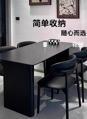 意式极简黑色岩板餐桌椅组合轻奢设计适合小户型家用及出租屋