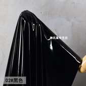 纯黑色超亮极滑镜面亮面柔软高弹力反光泽皮革 仿皮服装 布料面料